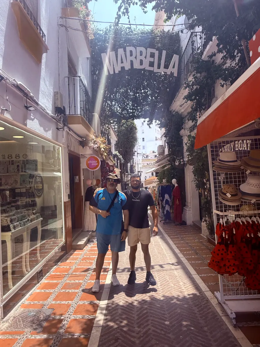 The Marbella Flooring team under the Marbella archway in old town Marbella, Spain